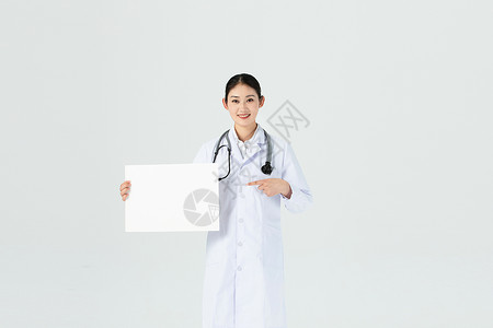 医院广告女医生手持白纸形象背景