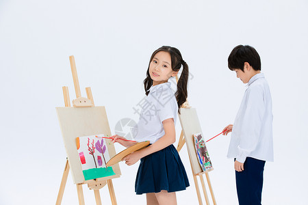 小女孩与小男生一起画画背景图片