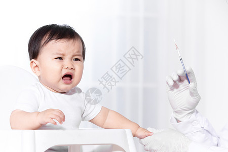 宝宝打针医生给婴儿扎疫苗背景