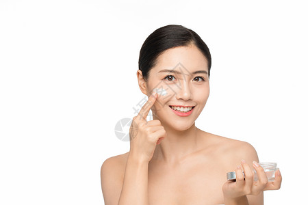 测试皮肤湿润度美女使用面部护肤品乳霜背景