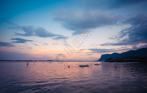 西山公园云南昆明晚霞湖泊湿地云彩背景