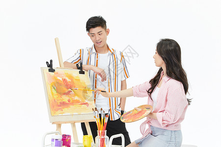 帅哥看女画家创作背景图片