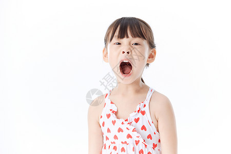 张嘴的人小女孩张嘴巴检查牙齿背景