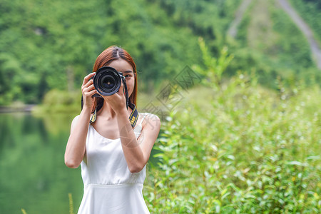 美女旅行相机拍照背景图片