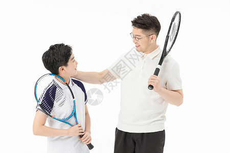父子一起打网球背景图片
