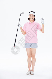 中年女性拿高尔夫球棒庆祝图片