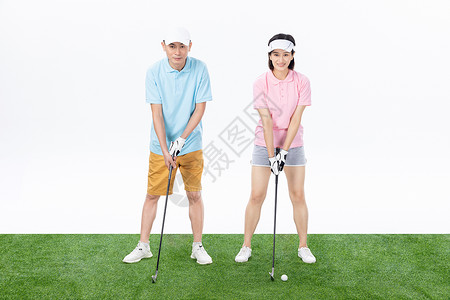 打高尔夫球人物中年夫妇打高尔夫球背景