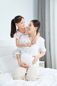 小女孩和孕妇妈妈图片