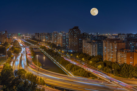 光线上升中秋节的北京光明桥背景