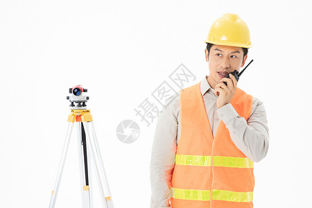  工人 维修工 维修工人工人拿着测量仪测量对讲机交谈背景图片