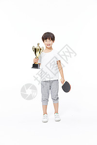 乒乓球少年手拿奖杯背景图片
