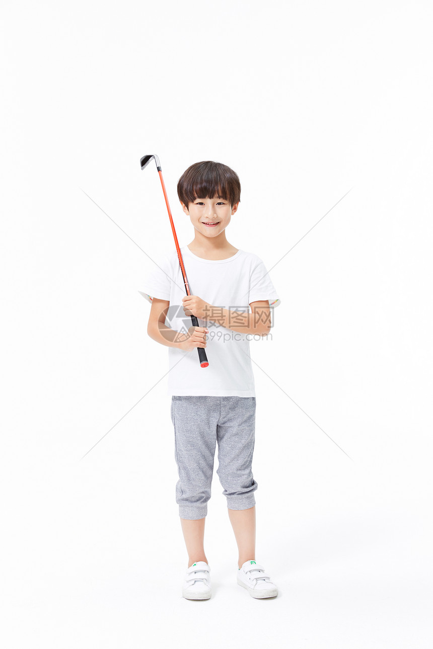 小男孩手拿高尔夫球杆图片