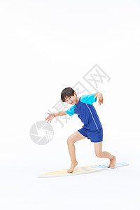 冲浪小男孩小男孩玩冲浪板背景