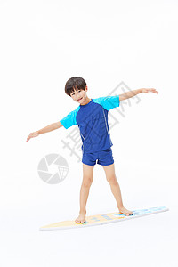 冲浪小男孩小男孩玩冲浪板背景