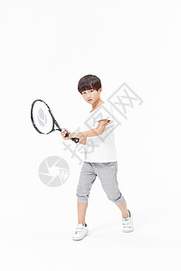 小男孩打网球背景图片
