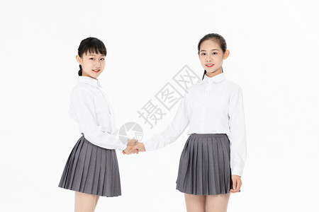 中学生好朋友握手合作图片