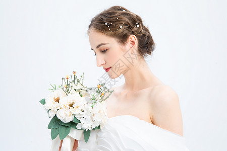 婚礼外国人外国优雅女性拿着花朵背景
