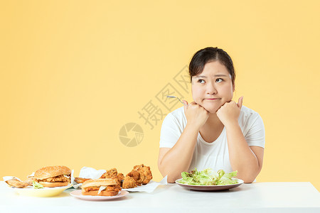 吃的胖的素材胖女孩吃色拉减肥背景