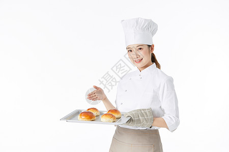 女性面点师手端面包背景