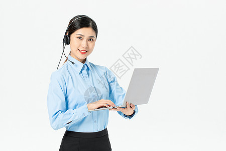 商务女性拿笔记本电脑图片