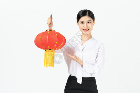 商务女性提红灯笼贺新年图片