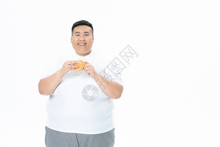 青年男性胖子吃汉堡背景图片