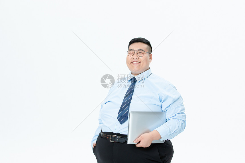 肥胖商务男性拿着笔记本电脑图片