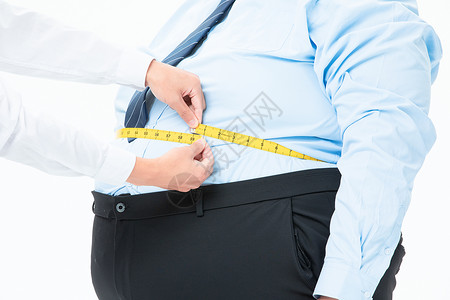 肥胖商务男性量腰围背景图片