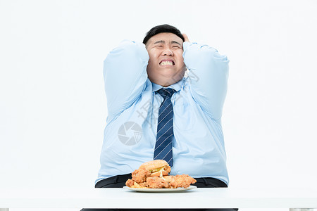 吃的胖的素材肥胖商务男性吃炸鸡背景