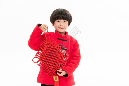 新年小男孩手拿中国节背景图片