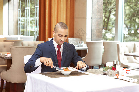 外国人酒店餐厅用餐背景图片