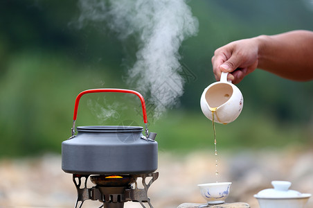 圣洁水锅炉户外煮茶背景