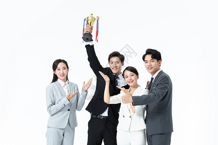 商务团队举奖杯庆祝背景图片