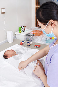 宝宝戴口罩医护人员给婴儿包被背景