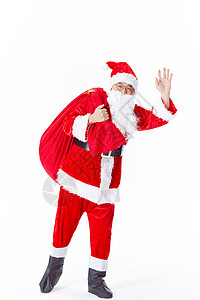 服装袋圣诞老人背着礼物袋背景