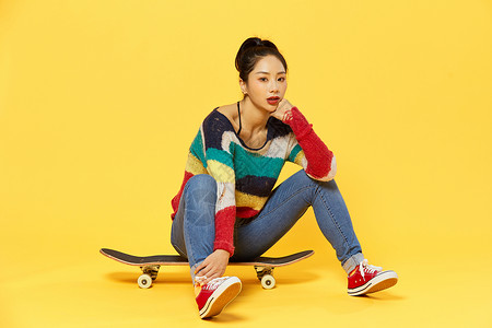 活力滑板女孩背景图片