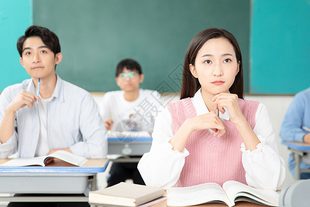 青年男女认真学习考研背景图片