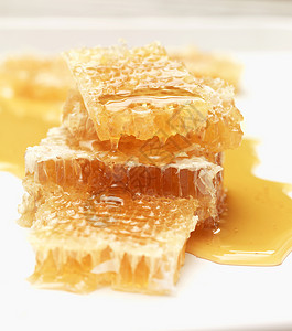 粘性食物生蜂巢上的蜂蜜背景
