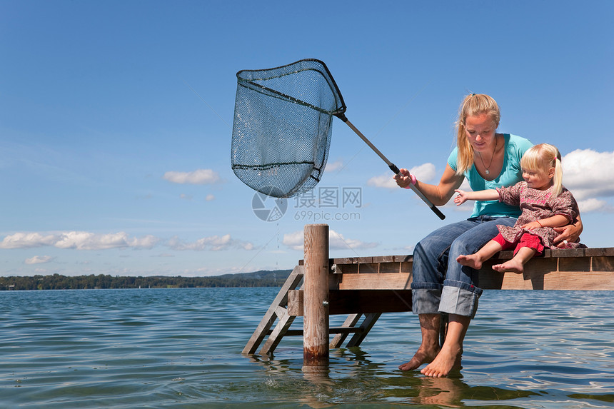 母女用网钓鱼图片