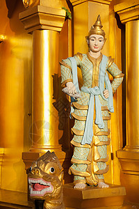 缅甸仰光首都施韦达贡塔的佛像背景图片