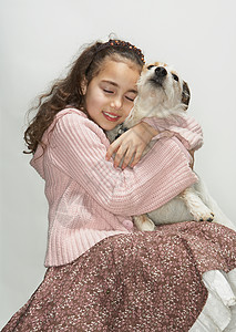 女孩和小狗的肖像高清图片