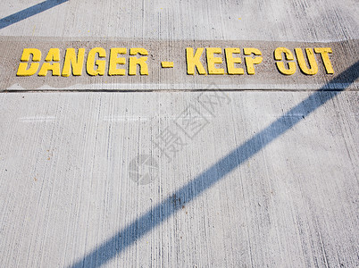 危险-禁止在混凝土地板上出现警告标志背景图片