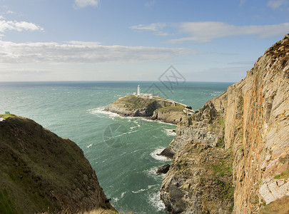 北威尔士安格尔西南塔灯塔视图背景