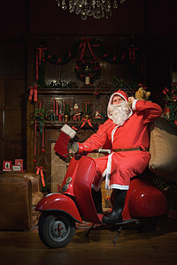 骑着拖把的圣诞老人图片