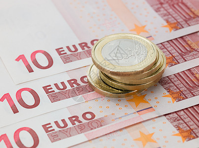 欧元硬币和纸币背景图片