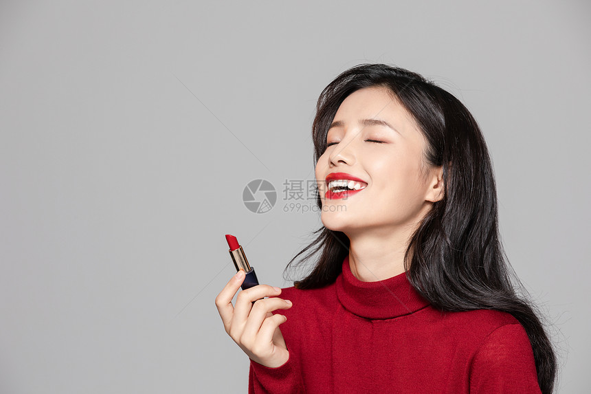 性感美女使用口红化妆图片