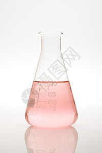 容量瓶中的粉红色液体背景