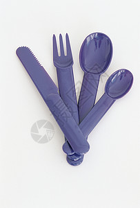 紫色餐具塑料餐具背景