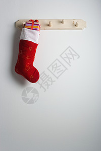 挂在钩子上的圣诞袜背景图片