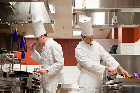 厨师工作素材厨师在商业厨房准备食物背景